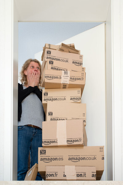 Woman being shocked by Amazon.com delivery