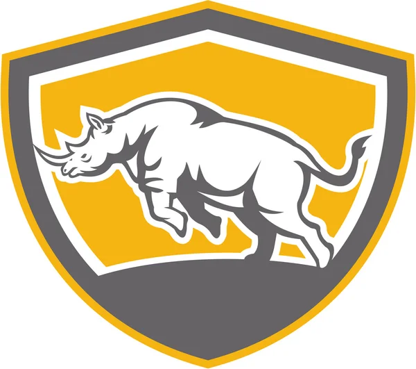 Rinoceronte carga lado escudo retro — Archivo Imágenes Vectoriales