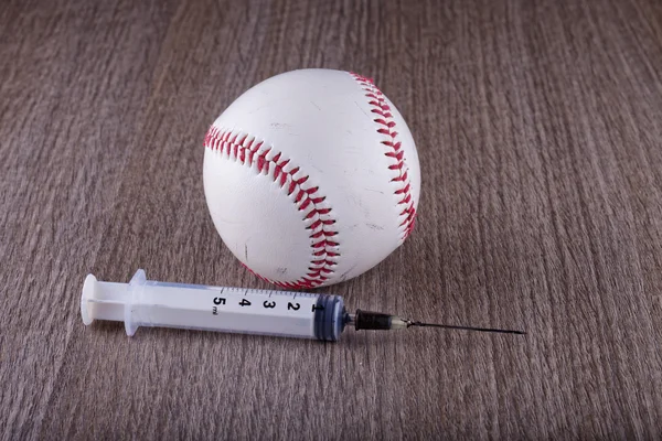 Baseball and syringe — Stock Photo, Image