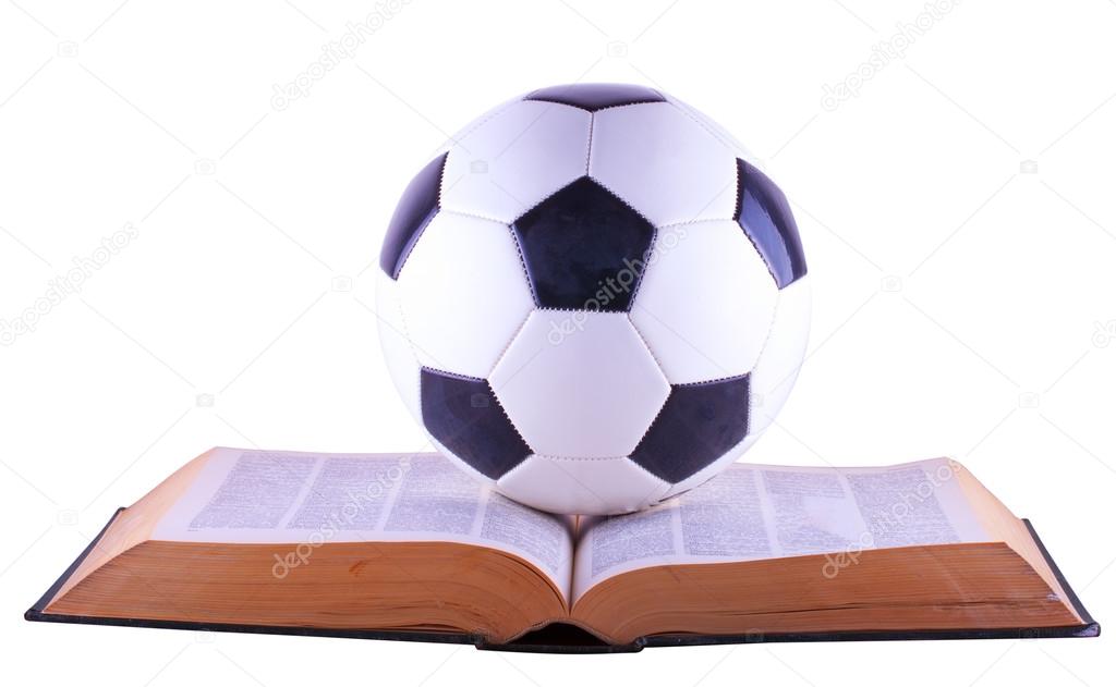 Soccer ball over book