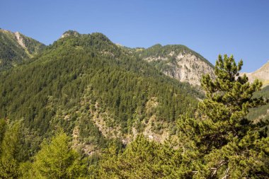 Beautiful mountain landscape under blue sky, horizontal view