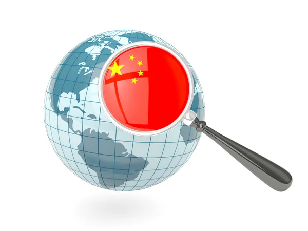Magnified flag of china with blue globe — Stock Photo, Image