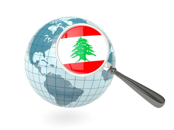 Magnified flag of lebanon with blue globe — Stock Photo, Image