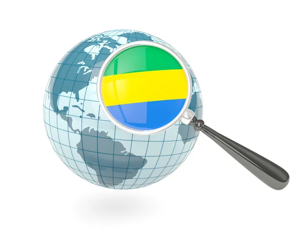 Zvětšená vlajka Gabonu s modrý glóbus — Stock fotografie