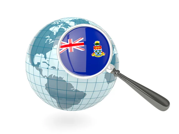 Magnified flag of cayman islands with blue globe — Stock Photo, Image