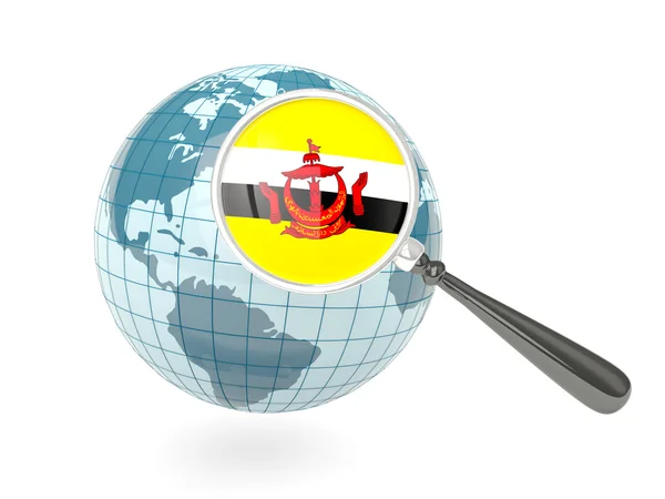 Magnified flag of brunei with blue globe — Stock Photo, Image