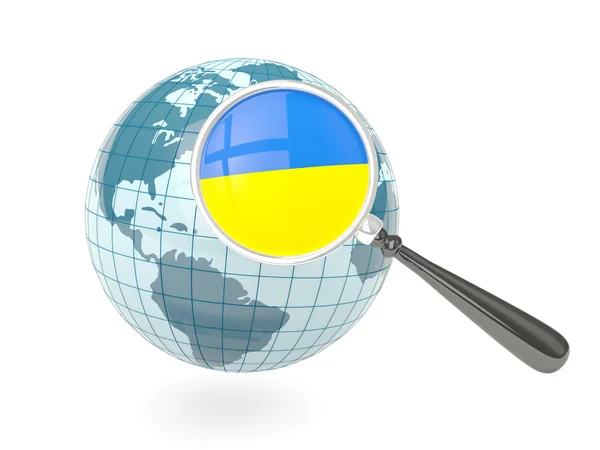 Magnified flag of ukraine with blue globe — Stock Photo, Image