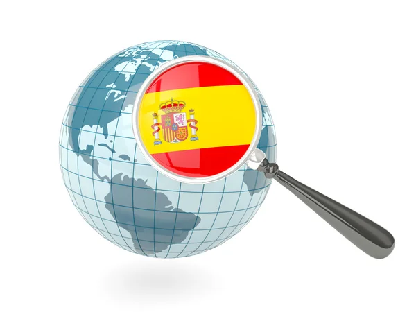 Magnified flag of spain with blue globe — Stock Photo, Image