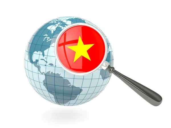 Увеличенный флаг Вьетнама с голубым глобусом — стоковое фото
