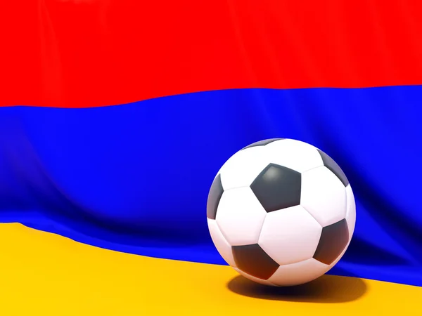 Флаг Армении с футболом перед ним — стоковое фото