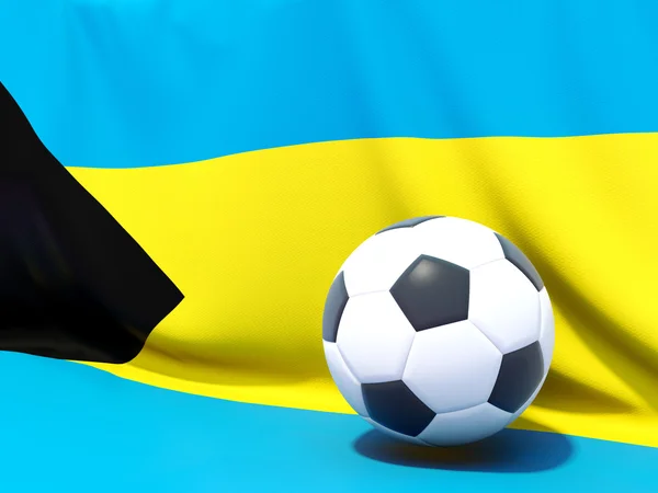 Bandeira de bahamas com futebol à sua frente — Fotografia de Stock