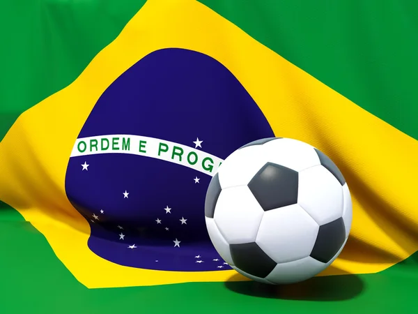 Bandeira do brasil com futebol à sua frente — Fotografia de Stock