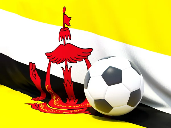 Flagga brunei med fotboll framför den — Stockfoto