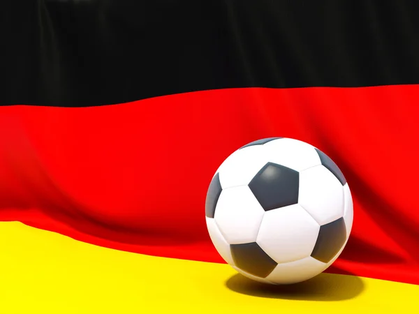 Flagga Tyskland med fotboll framför den — Stockfoto