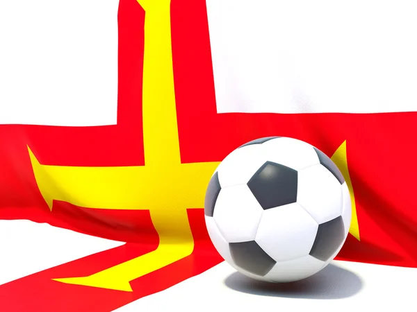 Flag of guernsey with football in front of it — Stock Photo, Image