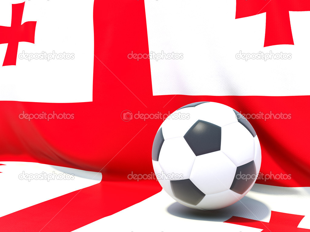 Flag of georgia with football in front of it