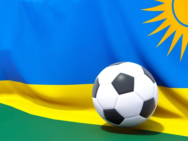 Bandeira do Ruanda com futebol à sua frente — Fotografia de Stock