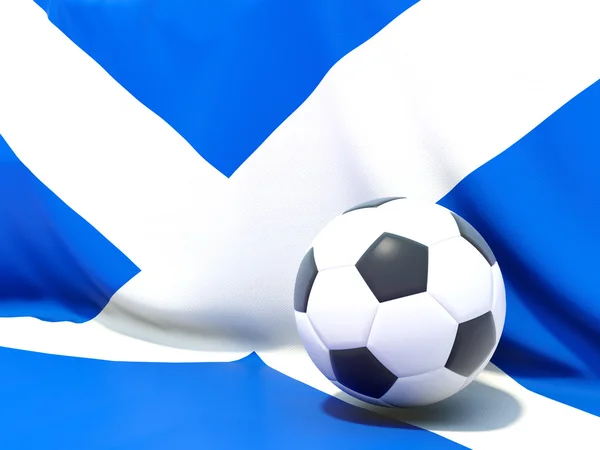 Flag of scotland with football in front of it — Stock Photo, Image