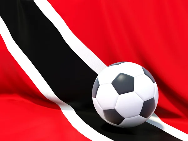 Bandiera di trinidad e tobago con il calcio di fronte — Foto Stock