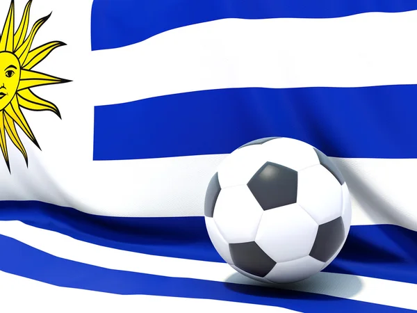 Bandeira do uruguai com futebol à sua frente — Fotografia de Stock