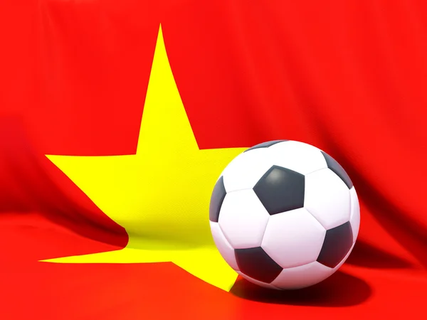 Флаг Вьетнама с футболом перед ним — стоковое фото