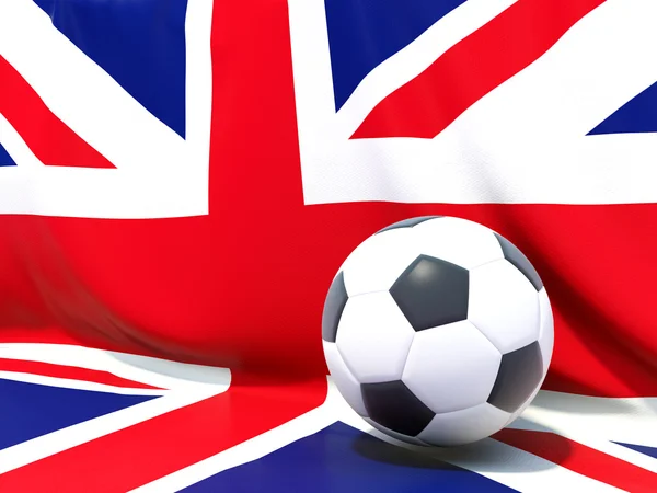 Flag of united kingdom with football in front of it — Stock Photo, Image