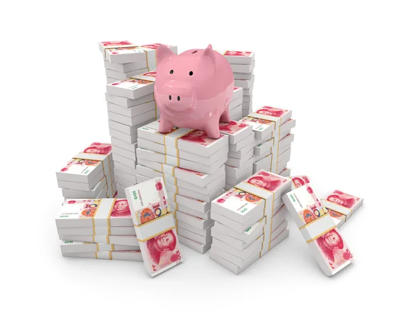 Piggy bank boven op de stapel van yuans — Stockfoto