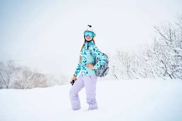 Portrait Cheerful Skier Girl Blue Sweater Yellow Helmet Snowy Weather — Stock Photo, Image