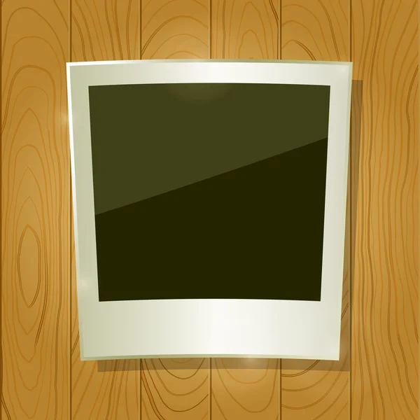 Marco instantáneo de la foto en tablero de madera — Vector de stock