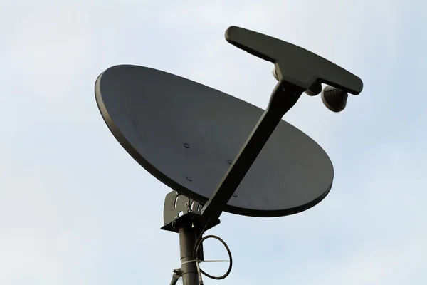 Gray Home TV Dish Against Blue Sky — Stock Photo, Image