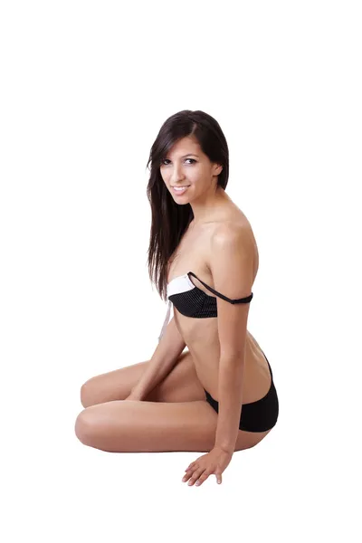 Jeune femme assise en soutien-gorge et culotte — Photo