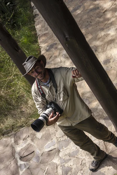 Man met camera — Stockfoto