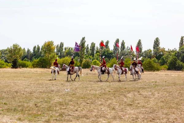 Gyenesdias Hungary May 22 2022: Unidentified reenactors military horseman fighting the historic war (XIV century) in Hungary. That battle seen. Free Public event.