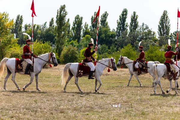 Gyenesdias Hungary May 22 2022: Unidentified reenactors military horseman fighting the historic war (XIV century) in Hungary. That battle seen. Free Public event.