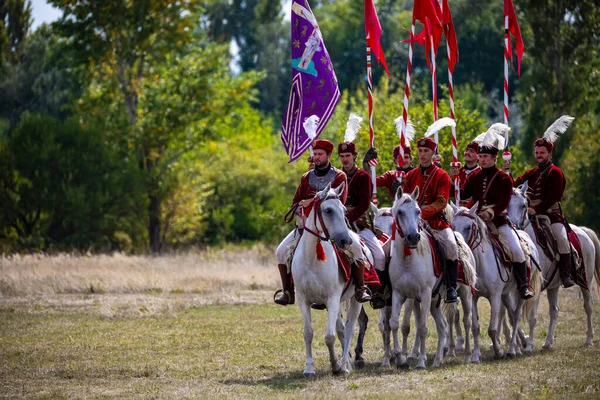 Gyenesdias Hungary May 22 2022: Unidentified reenactors military horseman fighting the historic war (XIV century) in Hungary. That battle seen. Free Public event.