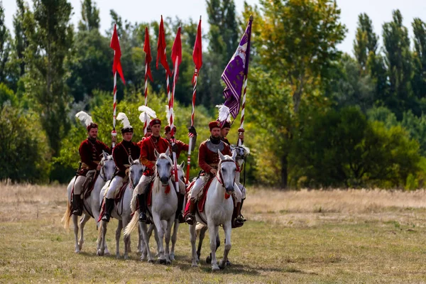 Gyenesdias Hungary May 22 2022: Unidentified reenactors military horseman fighting the historic war (XIV century) in Hungary. That battle seen. Free Public event.