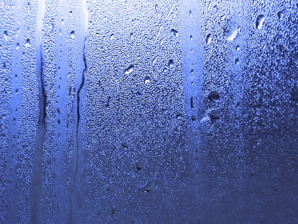 Water patterns on window — Stock Photo, Image