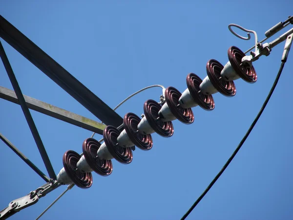 Electric insulators on pylon — Stock Photo, Image