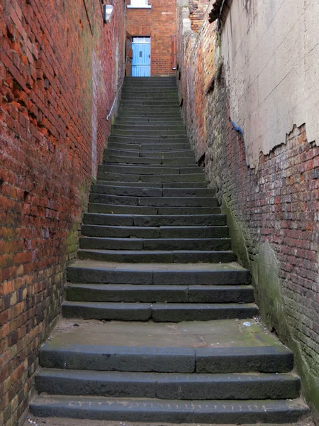 Steps to blue door — Stock Photo, Image