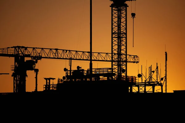 Construction Site Sunset Cranes Building Apex Silhouette Sky — Fotografia de Stock