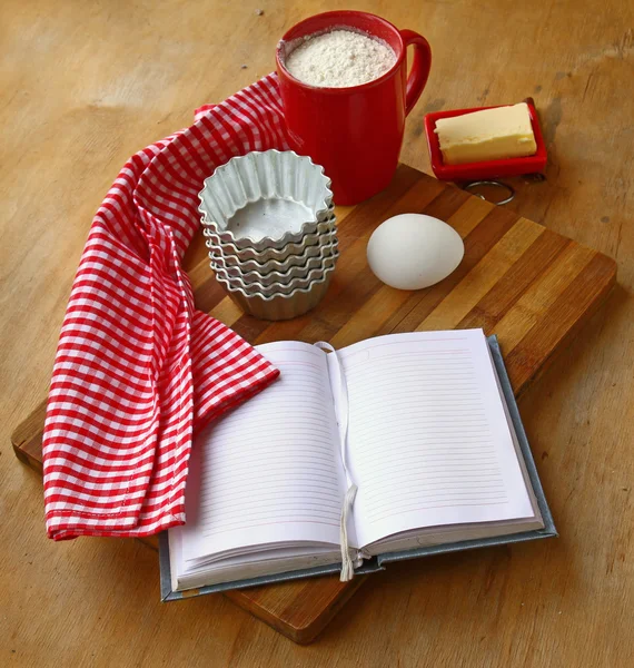 Recipe book on the table in the kitchen — Stock Photo, Image