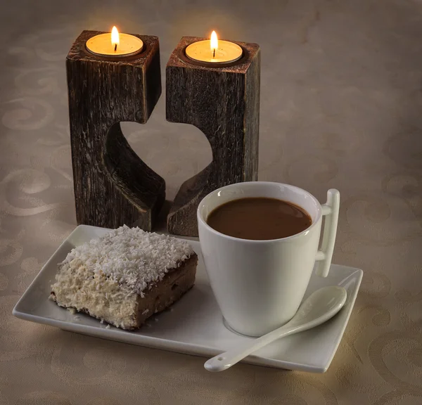 Cup of coffee with candlesticks — Stock Photo, Image