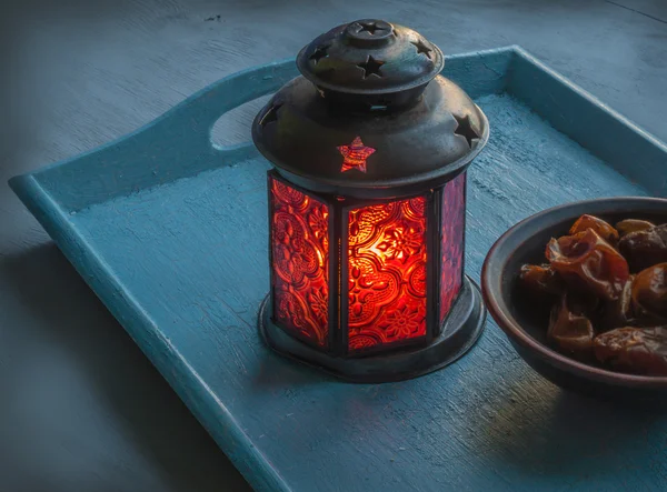 Lamp and dried fruit — Stock Photo, Image