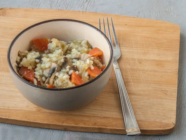 Stewed Rice Mushrooms Onions Gray Bowl Wooden Tray Gray Table — Stockfoto