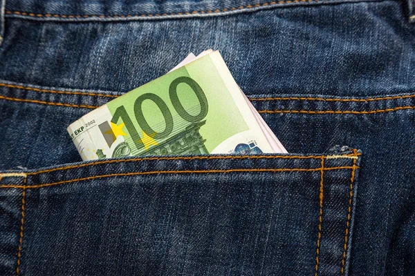 Euro banknotes in jeans back pocket — Stock Photo, Image