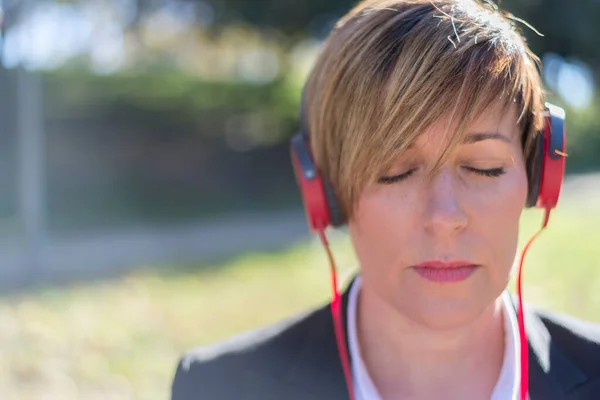 Relaxed Lady Listening Music Meditating Outdoors Nature — Stockfoto