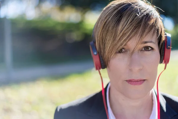 Relaxed Lady Listening Music Meditating Outdoors Nature — Fotografia de Stock