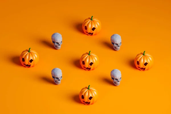Rhombus From Halloween Pumpkin And white skulls. 3d illustration