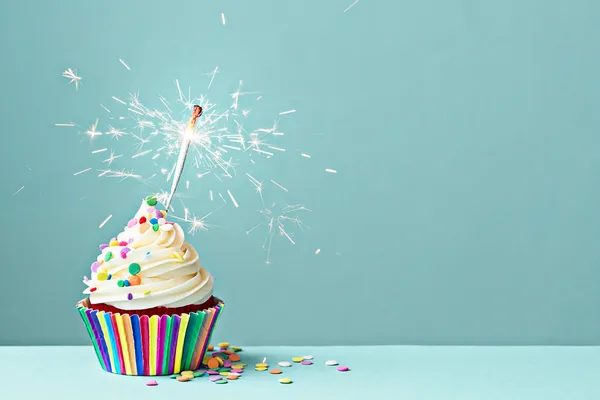 Celebration cupcake with sparkler — Stock Photo, Image