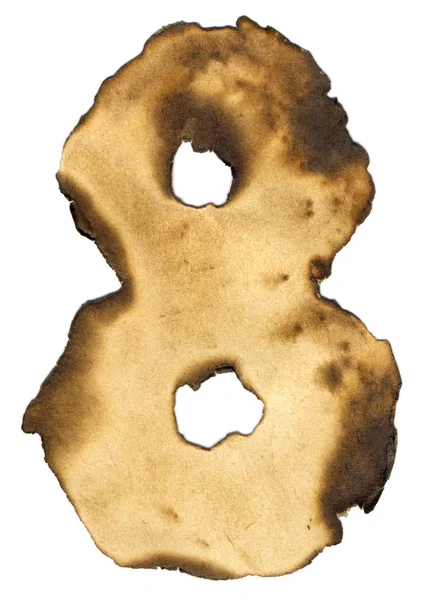 Verbrannte Papierfiguren isoliert auf weißem Hintergrund. Zahl acht — Stockfoto